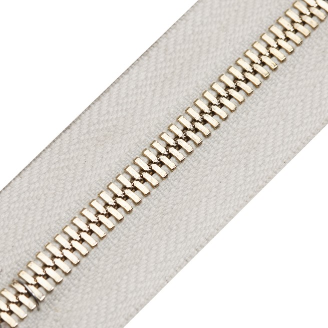 Блискавка метал FUTURA рулонний 5мм білий / cв.золото